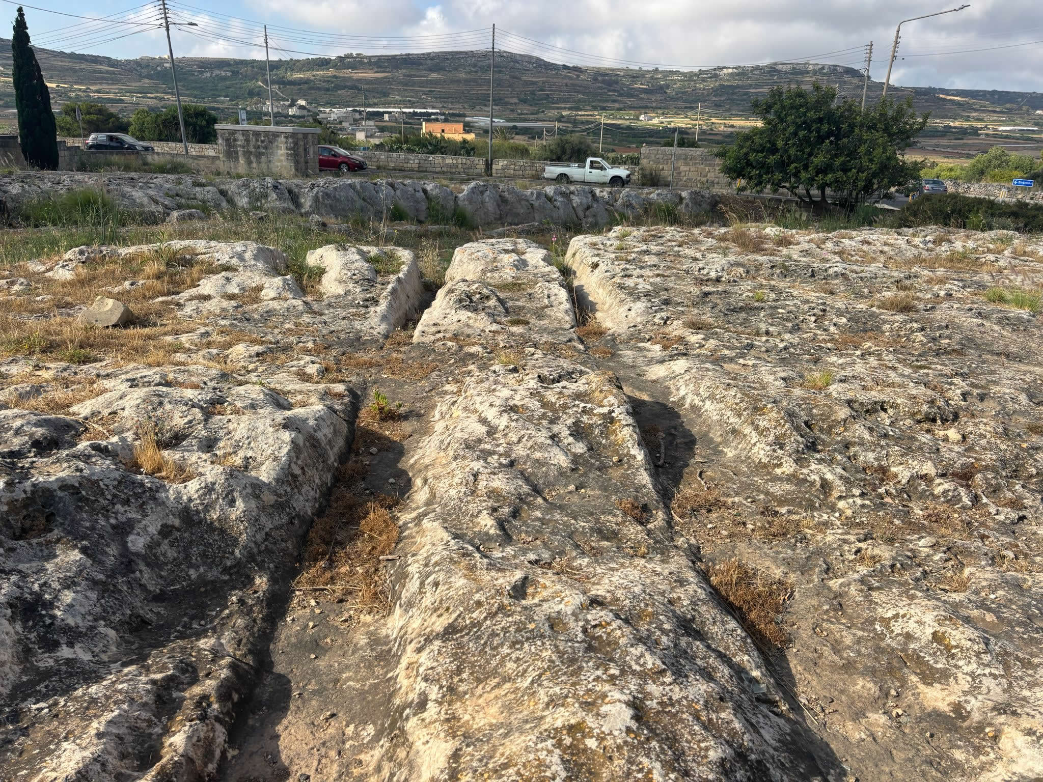 Ancient cart ruts near Mgarr Malta carved into limestone bedrock