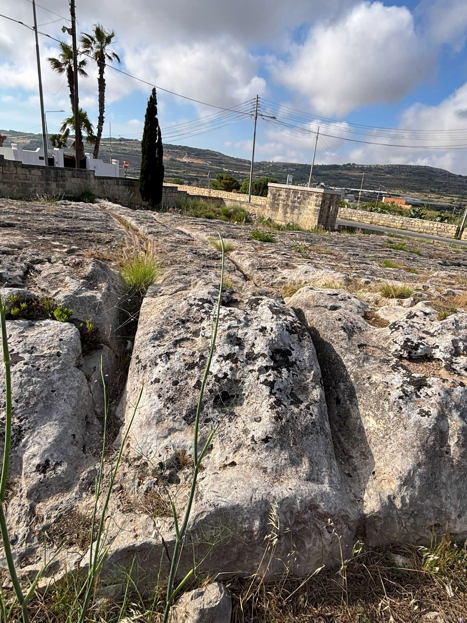 Ancient cart ruts near Mgarr Malta carved into limestone bedrock