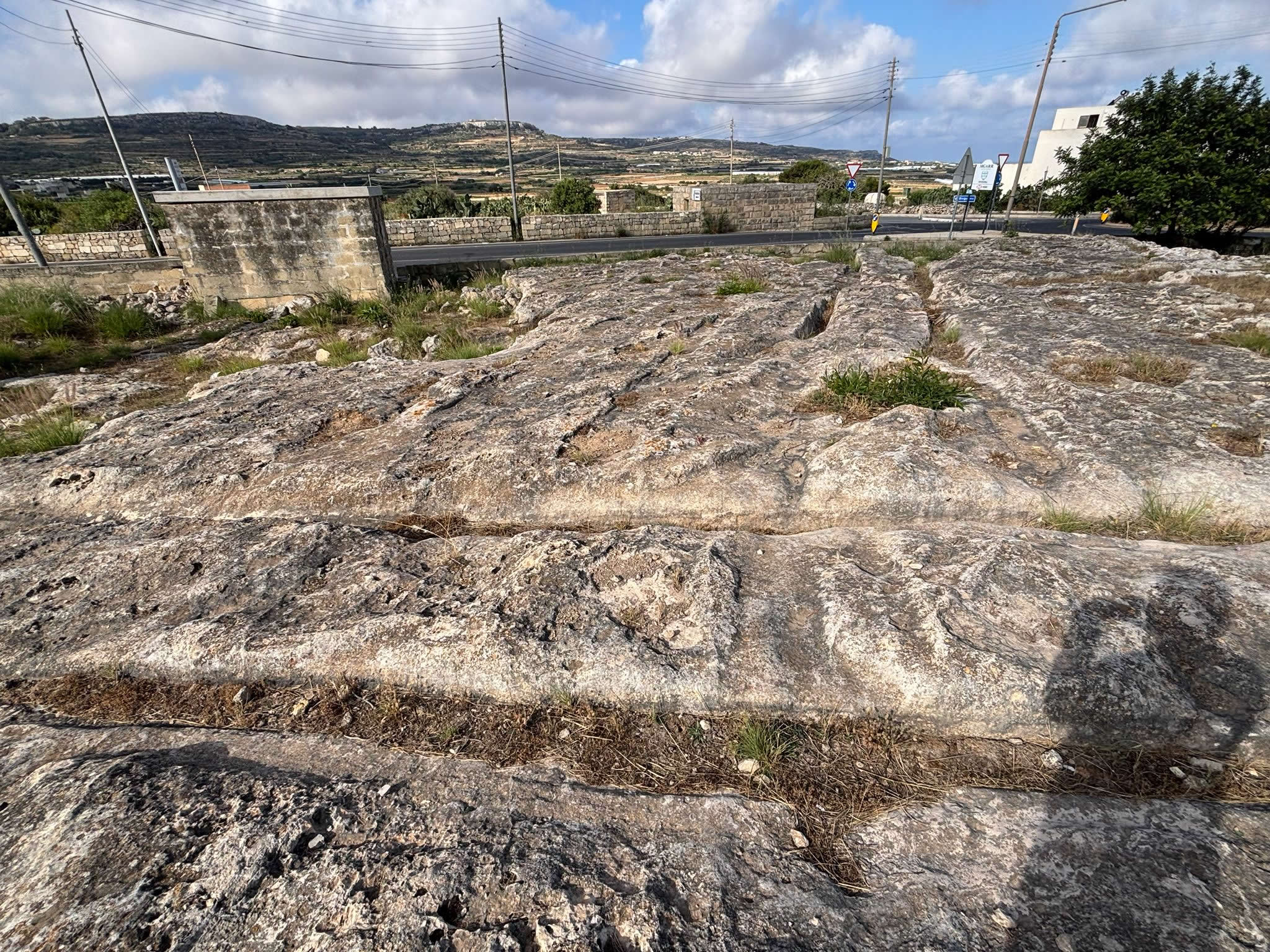 Ancient cart ruts near Mgarr Malta carved into limestone bedrock