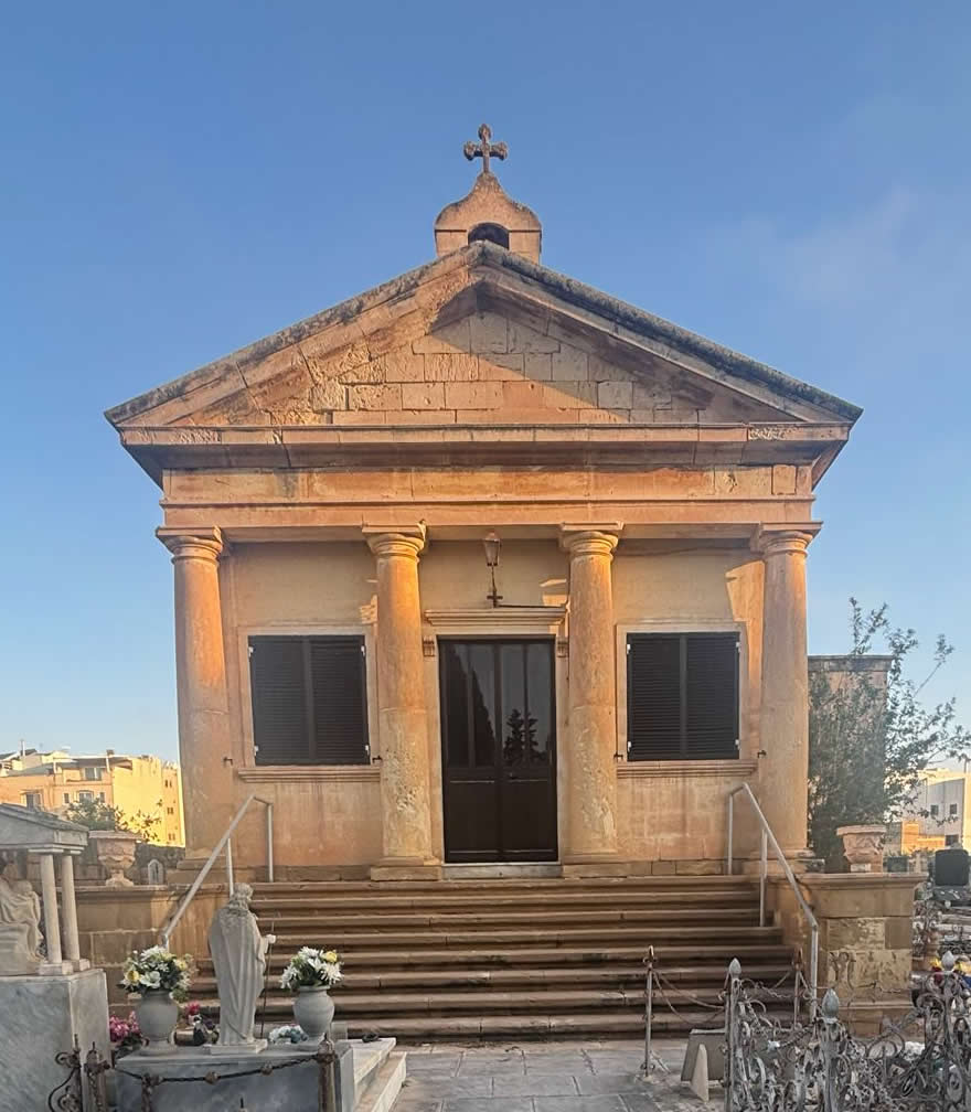 Dignified facade of the 1676 Madonna tal-Hniena Chapel enclosed within Zabbar Cemetery
