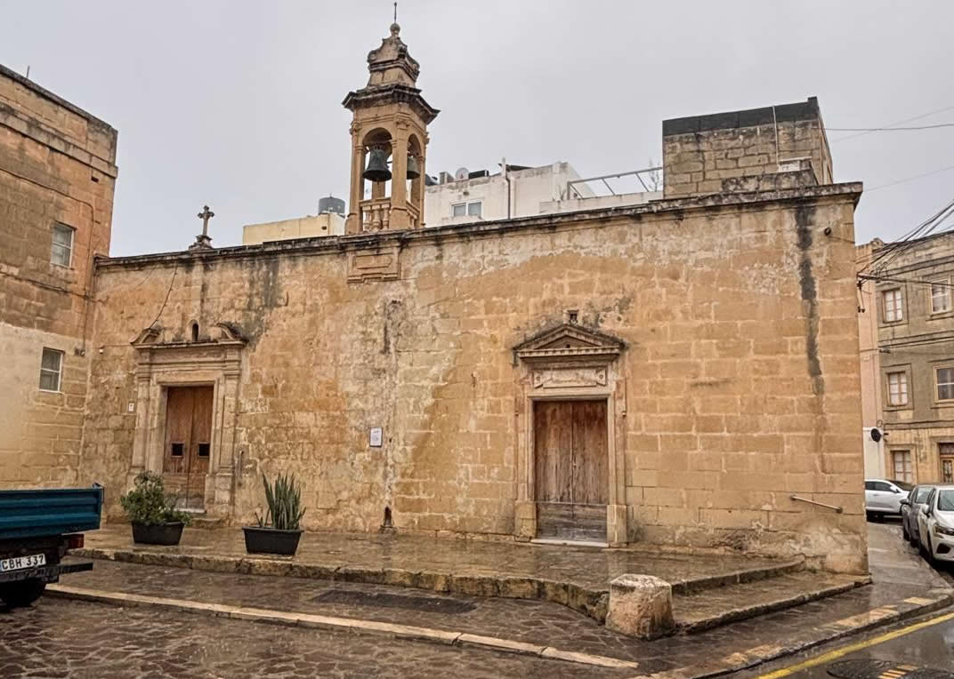 Detailed facade view of the conjoined Chapel of the Nativity of the Blessed Virgin Mary next to Tal-Ftajjar in Luqa Malta