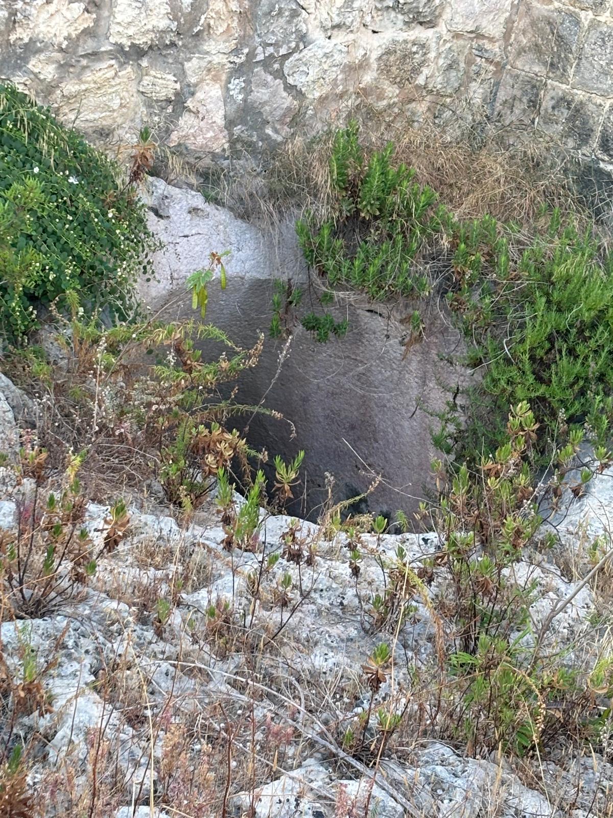 View looking outward through the interior Fougasse mouth showing proximity to the redoubt walling foundations