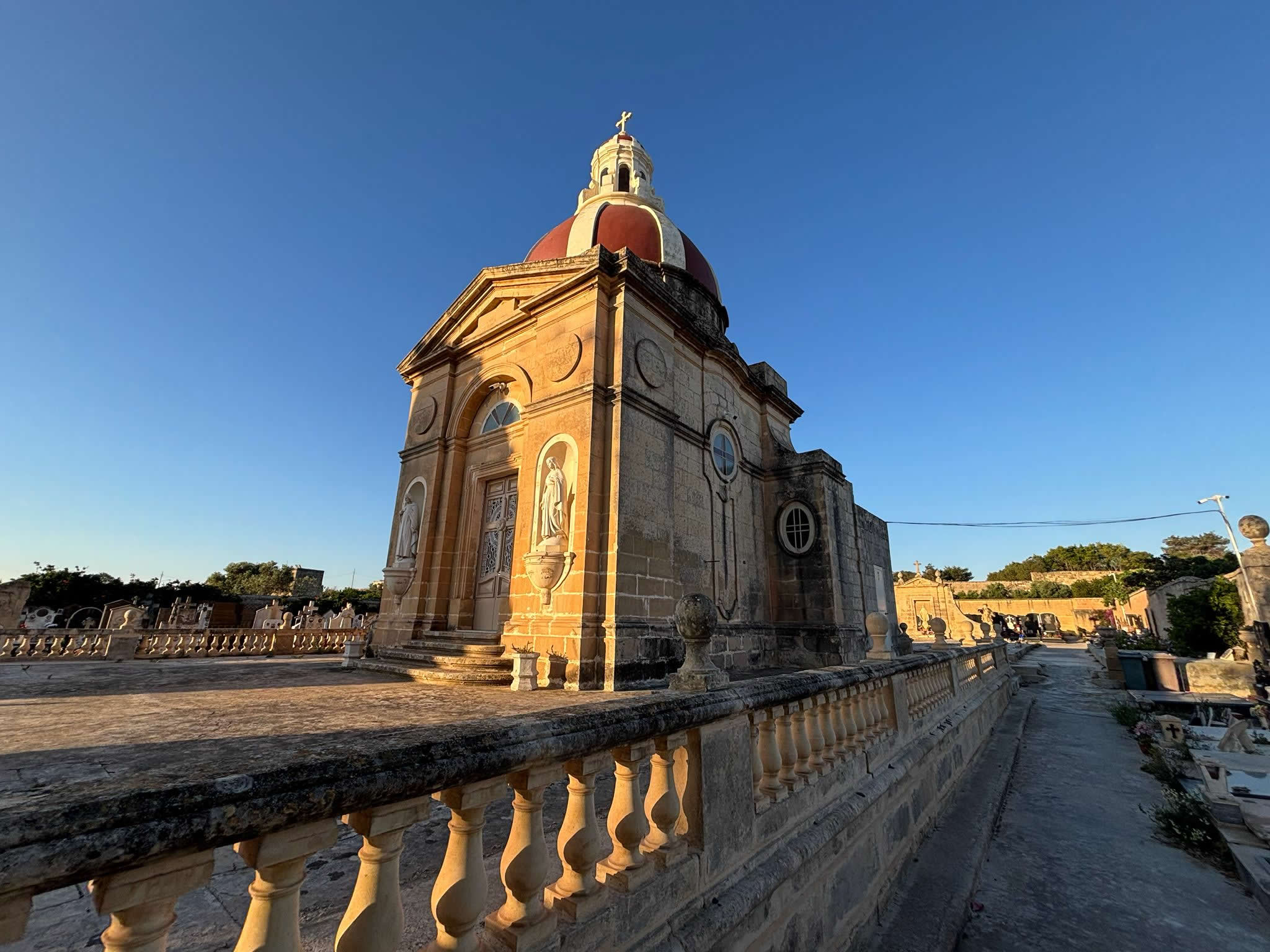 Historic entrance and funerary architecture at Luqa Cemetery in Luqa Malta