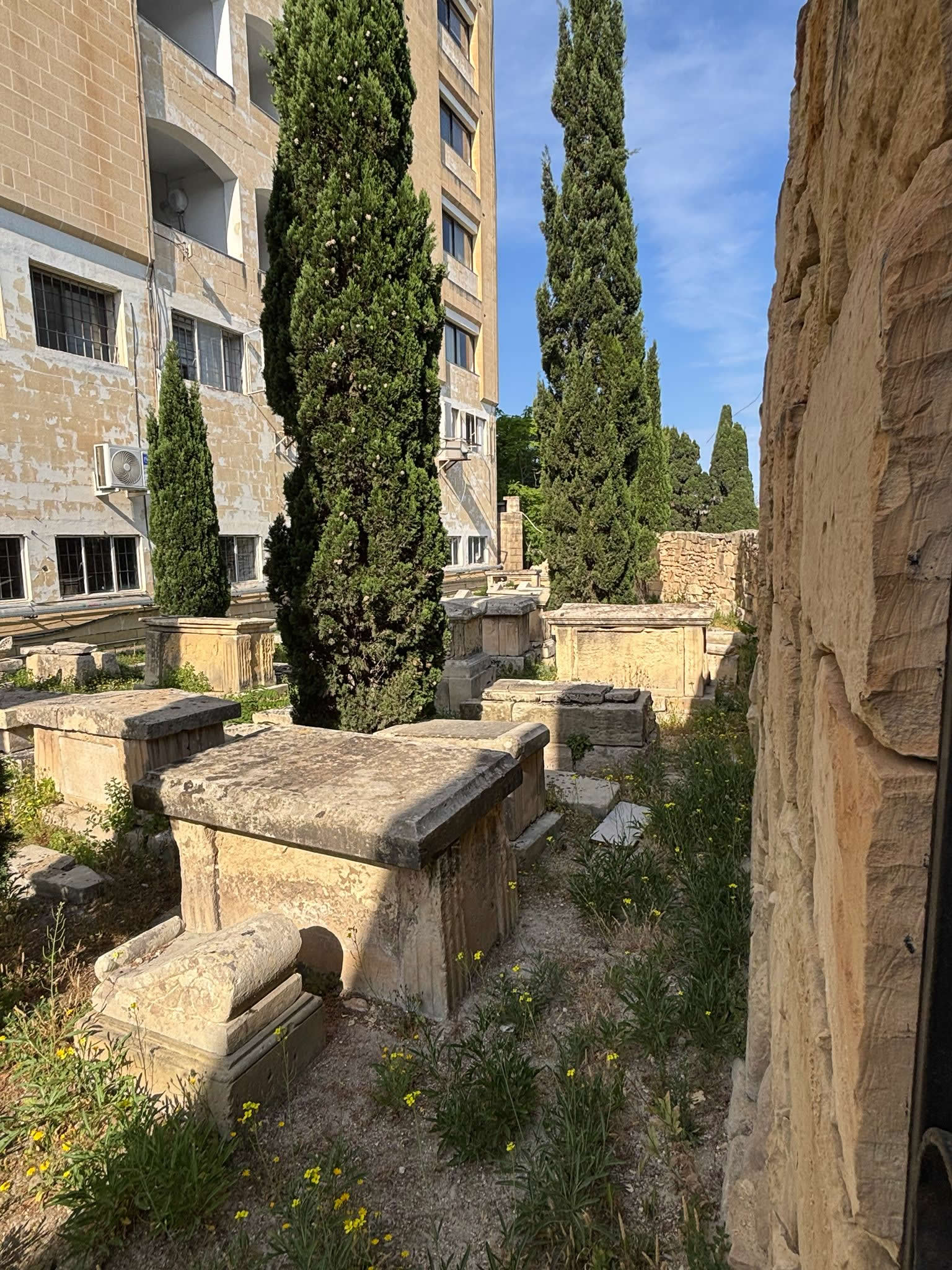 Horizontal Sephardic tombs and Hebrew inscriptions within Ta Braxia Jewish Cemetery