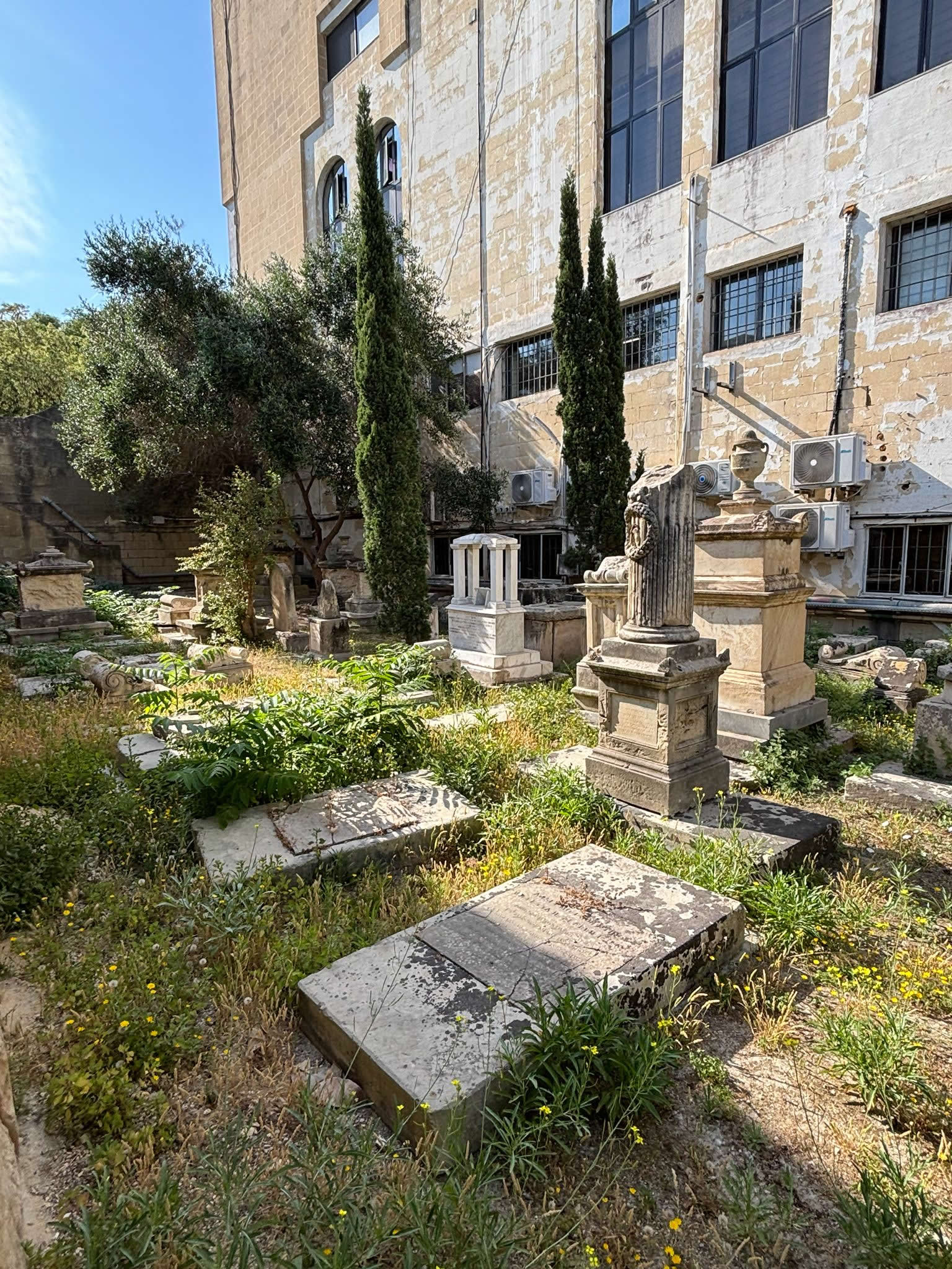 Horizontal Sephardic tombs and Hebrew inscriptions within Ta Braxia Jewish Cemetery