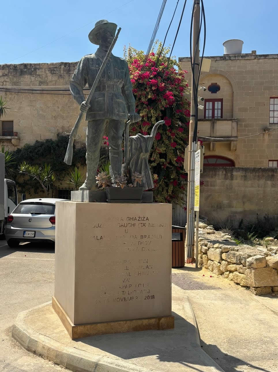 Għarb World War II War Memorial in St Peter's Square, Gozo, commemorating Ġużepp Cauchi and Kalanġ Mizzi