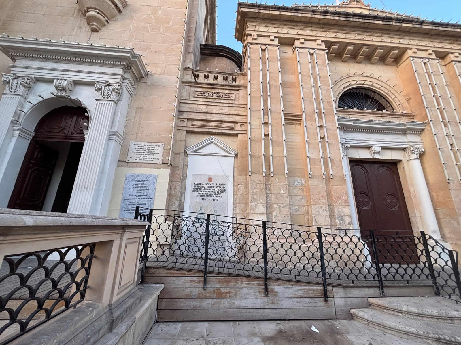 Overall view of the Second World War memorial plaque on the Parish Church of St Cajetan in Ħamrun, Malta