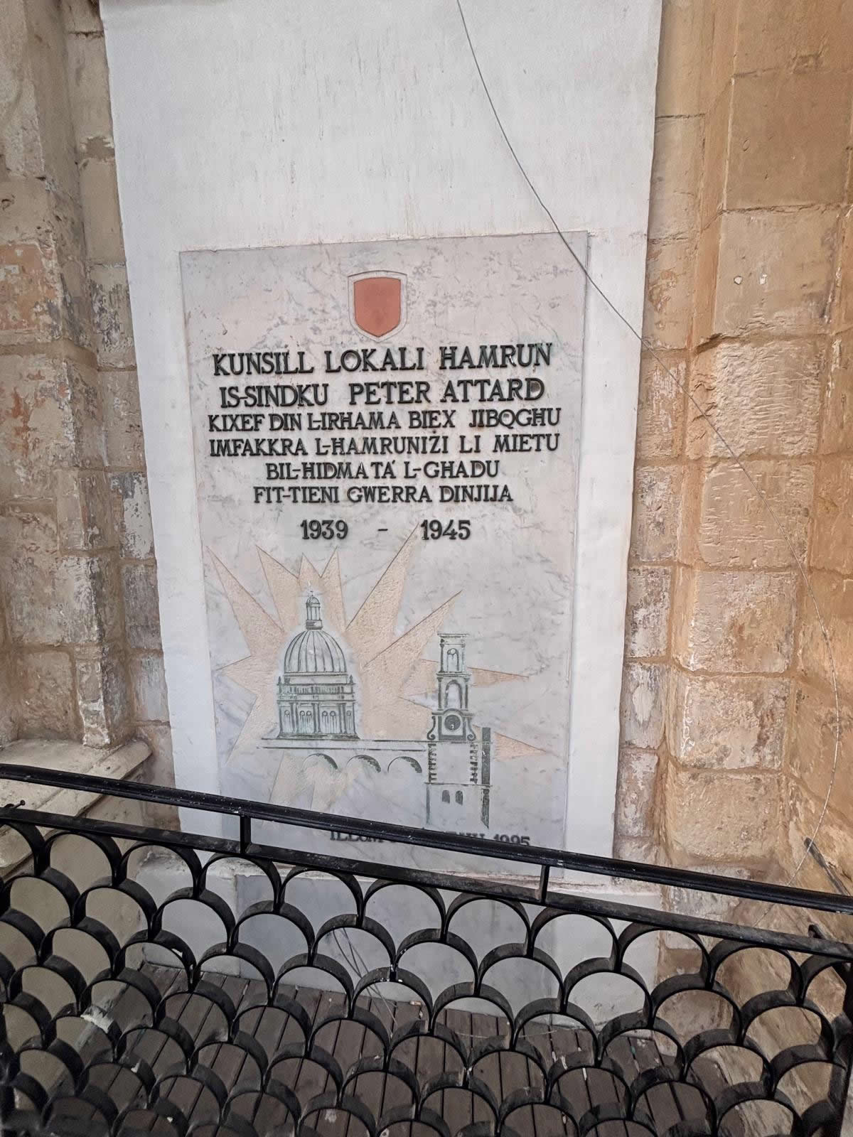Close-up of the Ħamrun World War II memorial inscription
