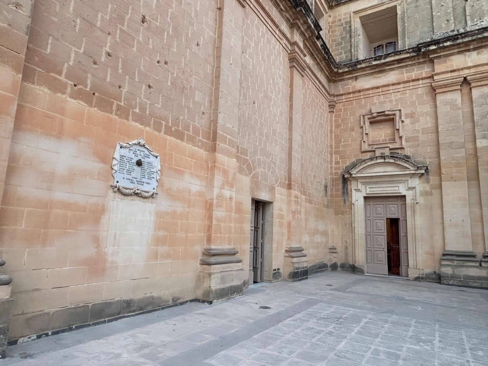 Mqabba Malta World War II War Memorial 1939–1945 on the exterior wall of the parish church