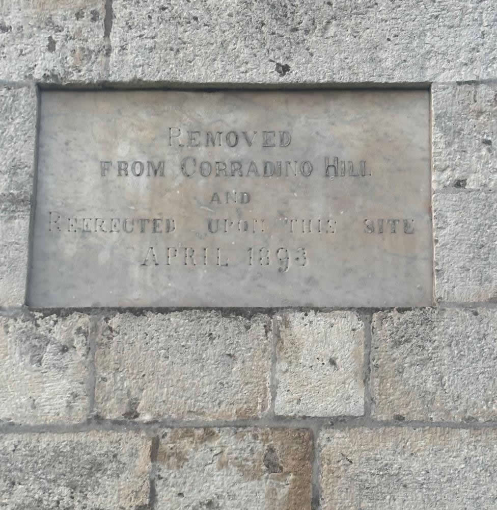 Relocation inscription on the Spencer Monument recording its move from Corradino Hill